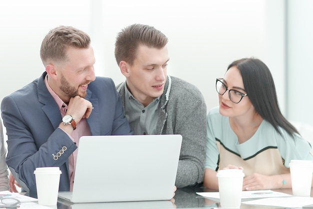 Business team discussing the terms of the new contract at a meeting in the office.