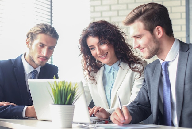 Business team discussing together business plans in office