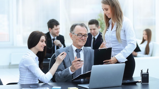 Business team discussing with the head of financial data