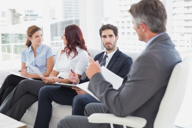 Business team discussing work notes