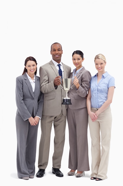 Business team holding a cup