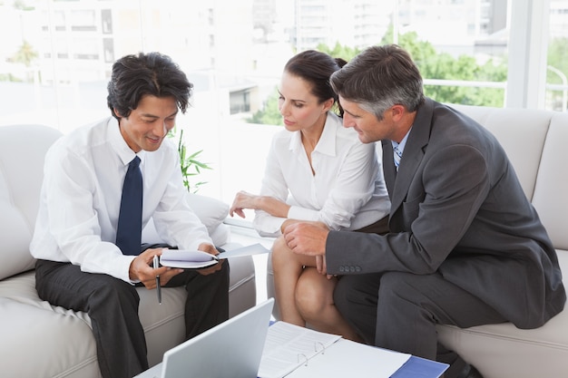 Business team looking over notes