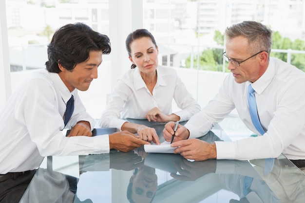 Business team looking over notes