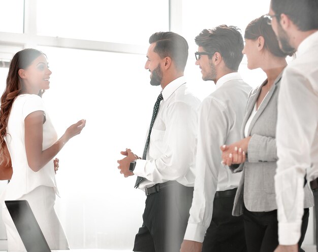 Business team looks out the office window photo with copy space