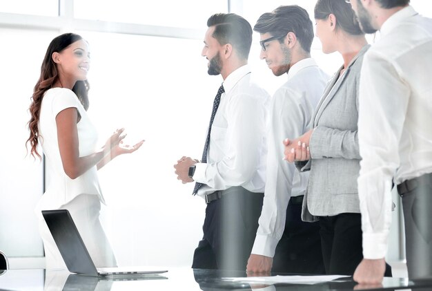 Business team looks out the office window