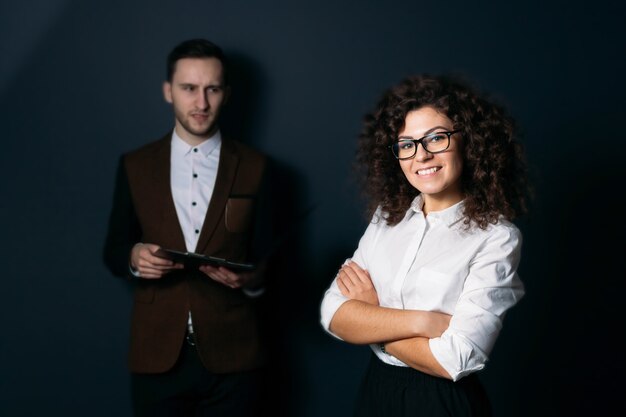 business team man and woman on a blue background 
young startup