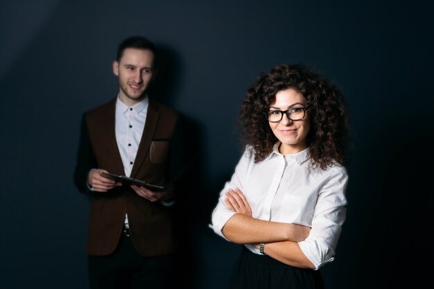 Business team man and woman on a blue background 
young startup