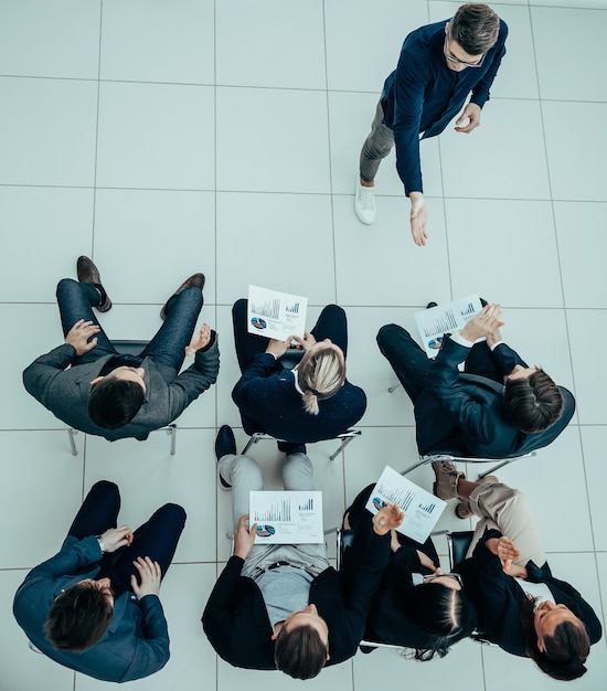 Business team reporting results at a working meeting