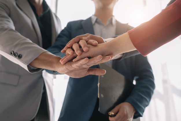 Business team shake hands confidently professional investor working with new startup project at an office meeting