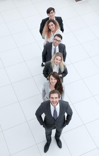 Business team standing in line isolated on white