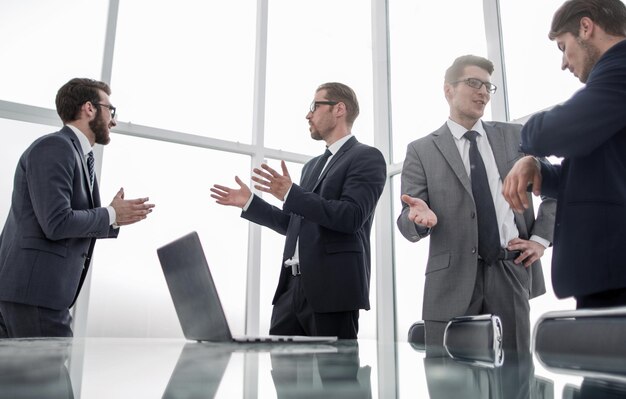 Business team standing in the office of the business centeroffice weekdays