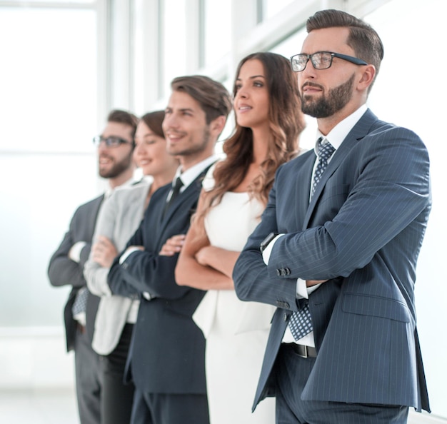 Business team standing in the officethe concept of teamwork