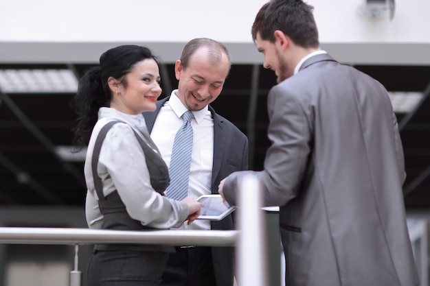 Business team talking standing in the office