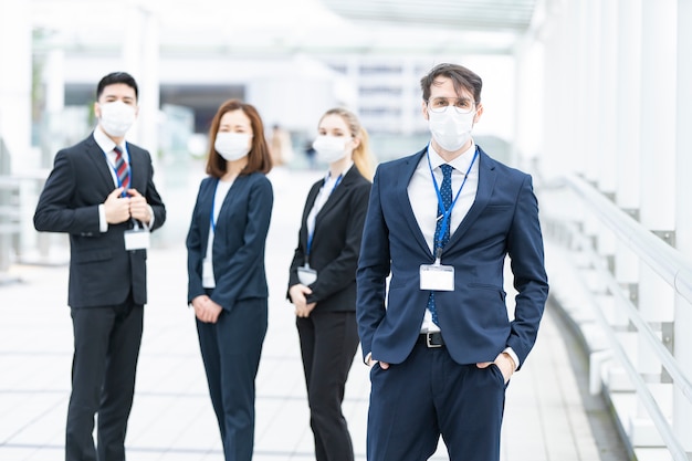 business team wearing masks