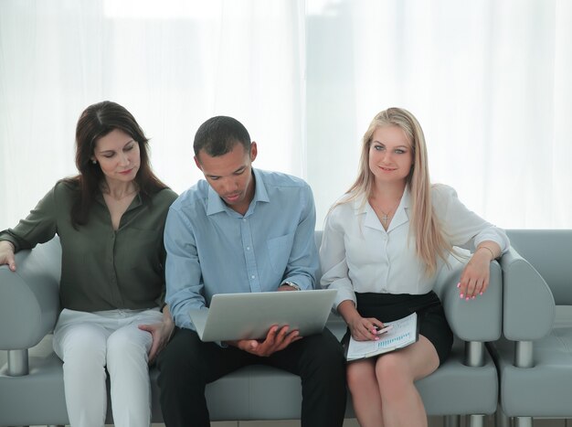 Business team with laptop during a work break  