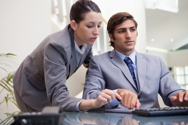 Business team working on pc together