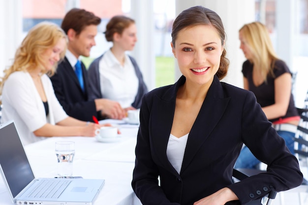 Business team working together and smiling