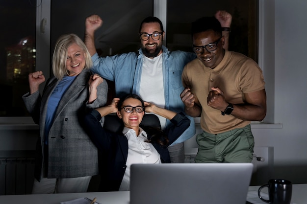 business teammates working late at the office