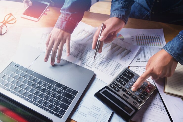 Photo business teamwork checking accounting report in office 