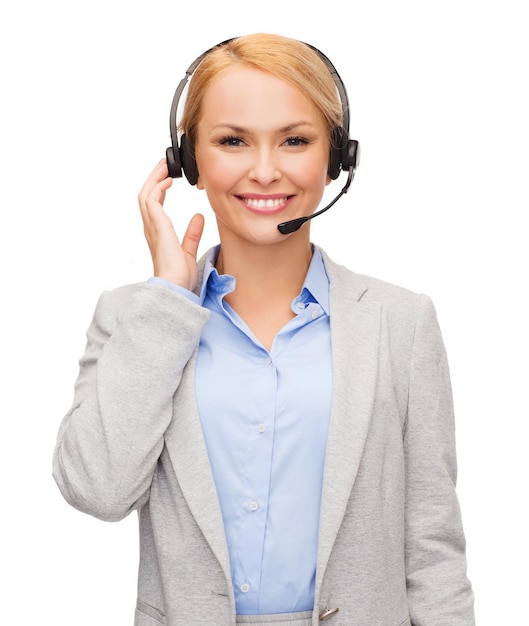 business, technology and call center concept - friendly female helpline operator with headphones