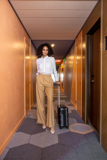 business trip elegant pretty business woman arriving to the hotel