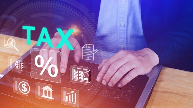 Business using computer to complete individual income tax\
return form online for tax payment government state taxes data\
analysis paperwork financial research calculation tax return