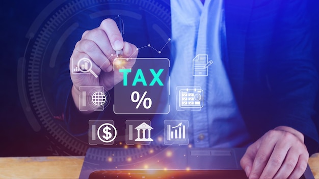 Business using computer to complete individual income tax\
return form online for tax payment government state taxes data\
analysis paperwork financial research calculation tax return