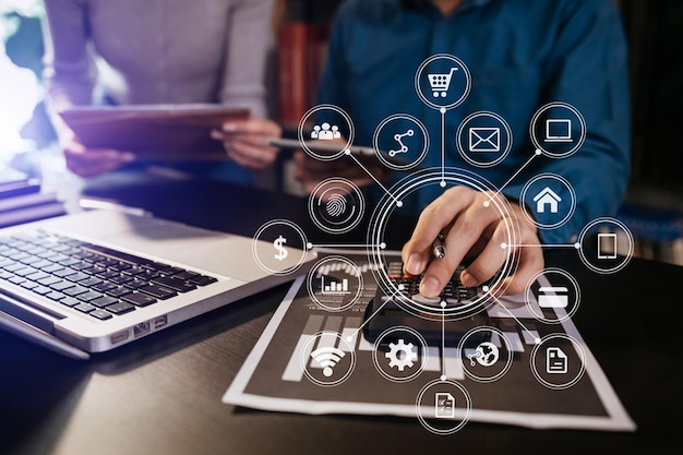 business using laptop and digital tablet with marketing virtual icon xA