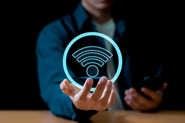 Фото Бизнес с использованием смартфона с значком wi-fi концепция деловой связи