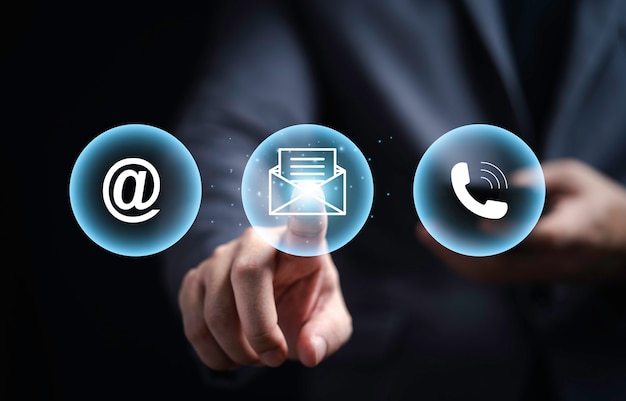 Premium Photo | Business website page contact , businessman touching contact us icons for customer service include telephone , address and email and message by 3d render. Premium Photo | Business website page contact , businessman touching contact us icons for customer service include telephone , address and email and message by 3d render.