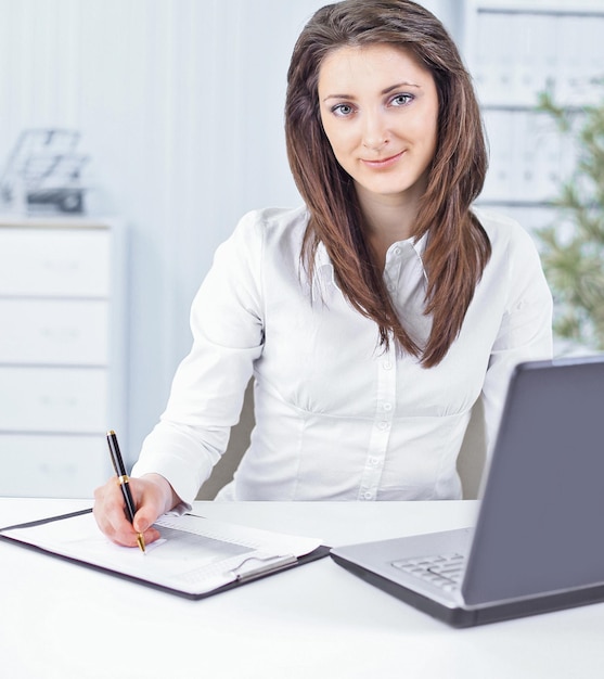 Business woman analyzing the financial schedule. photo with copy space