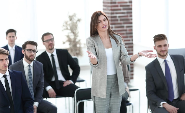 Business woman asks a question at a business meetingbusiness concept