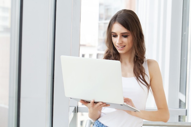 Business woman busy working on laptop computer at office