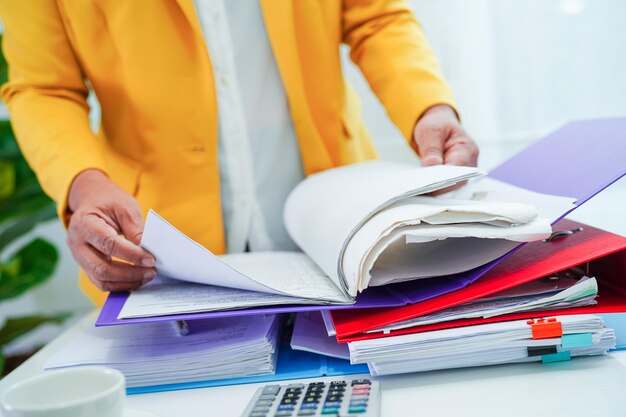 Business woman busy working with documents in office