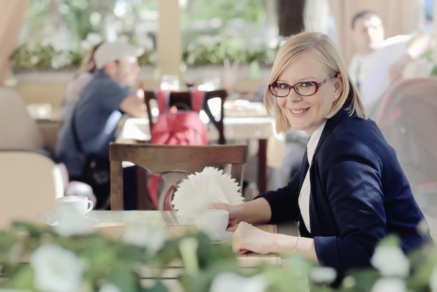 business woman in a cafe