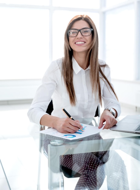 Business woman checking financial data photo with copy space