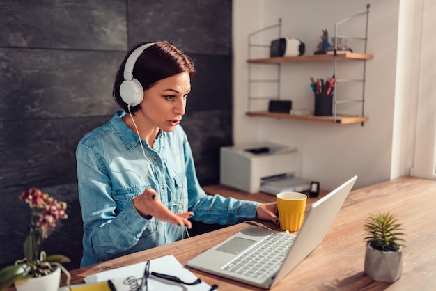 Business woman doing video call at office