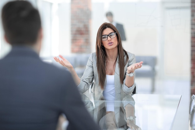 Business woman explaining to the client the terms of the contractbusiness concept