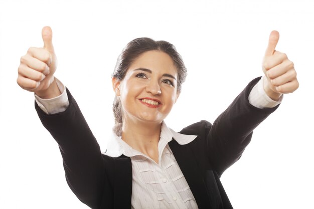 Business woman giving thumbs up