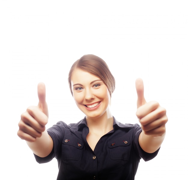 Business woman giving thumbs up