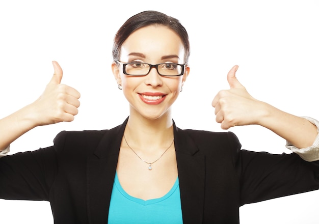 Business woman giving thumbs up