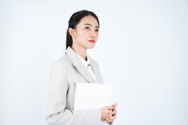 Photo business woman in grey suit reading document and prepare to meeting.