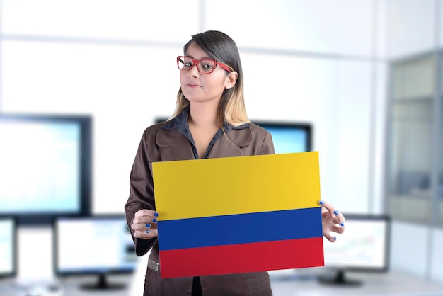 Business Woman Holding the Colombian Flag