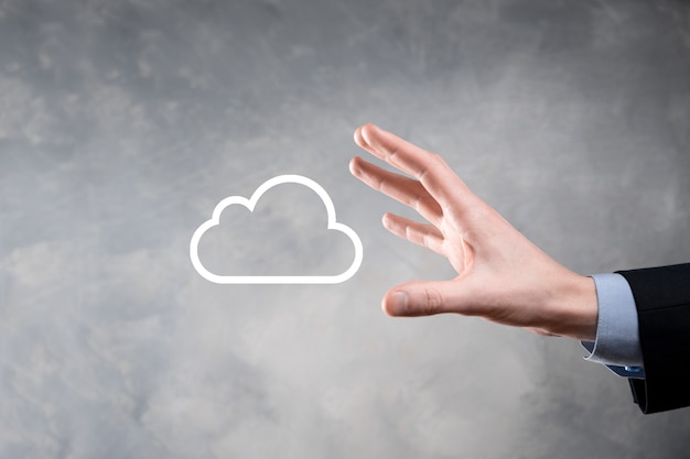 business woman holding icon cloud computing network and icon connection data information in hand. cloud computing and technology concept.