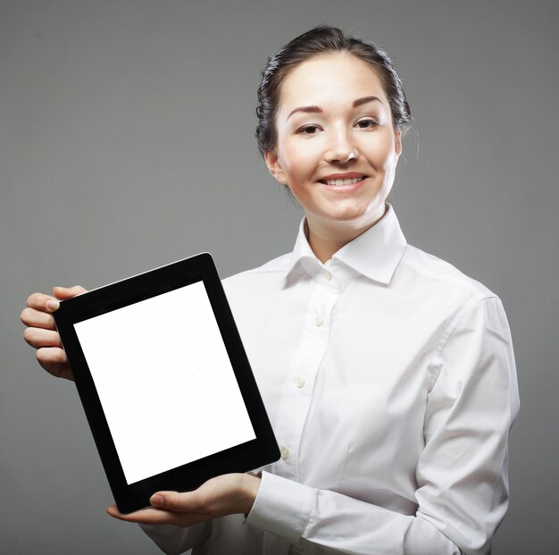 Business woman holding a tablet computer