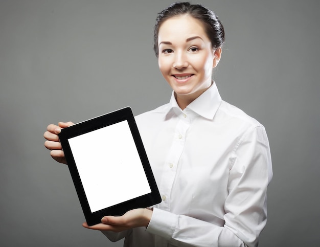 Business woman holding a tablet computer