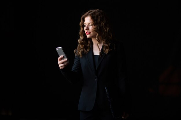 business woman is using a smartphone