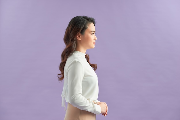 Business woman isolated on purplebackground