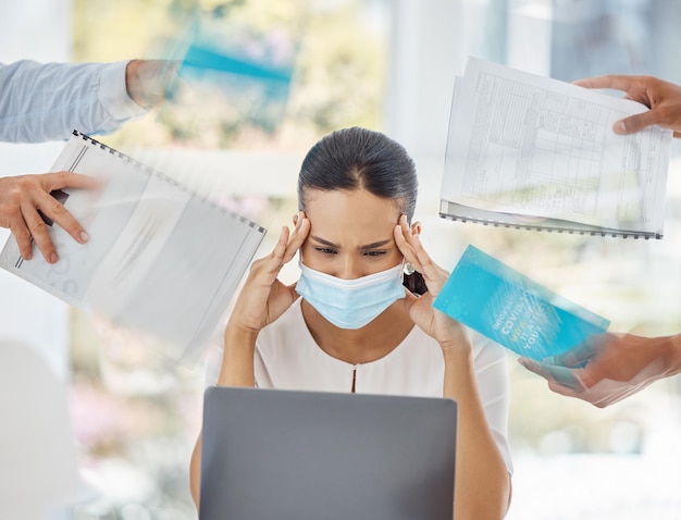 Business woman laptop and overwhelmed with workload headache or burnout working at the office Female employee trying to focus under pressure for deadline while overloaded with work at workplace