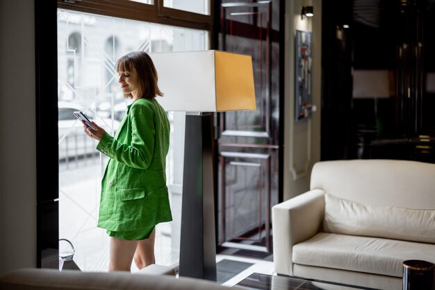 Business woman at lobby of luxury hotel